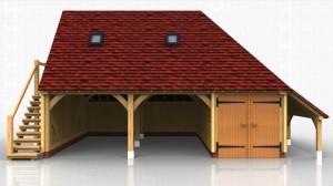 Three bay oak framed garage with external oak staircase leading up to the first floor. There are 2 open car bays and a smaller third bay with double doors on the front to make a secure workshop/storage area.