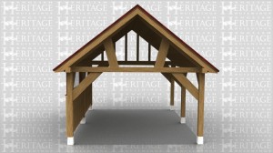 This oak framed car port has two bays, with one enclosed side to the front and the other sides open. The front side has two small windows and softwood weatherboarding.