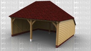 This is an open fronted two bay garage with hipped ends and a rear catslide to keep the ridge height to below 4m and maximise the internal floor area.