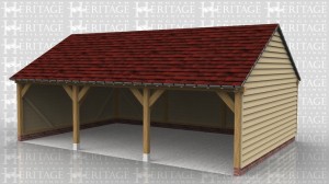 This three bay oak framed garage is open fronted and has gable ends with a low roof pitch.