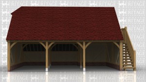 This is a three bay open fronted oak framed garage with rear catslide along two of the bays. The external oak staircase leads up to a solid single door to access the first floor. There are two rooflights to get some natural light into the upstairs space.