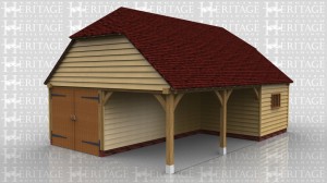 This oak framed garage has two open bays at the front and one enclosed, as well as an enclosed section to the rear, accessed by two sets of garage doors. The enclosed bays have mullion windows.
