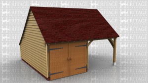 This oak framed two bay garage has one enclosed bay with garage doors and one open bay. The enclosed bay also has an enclosed logstore to the rear.