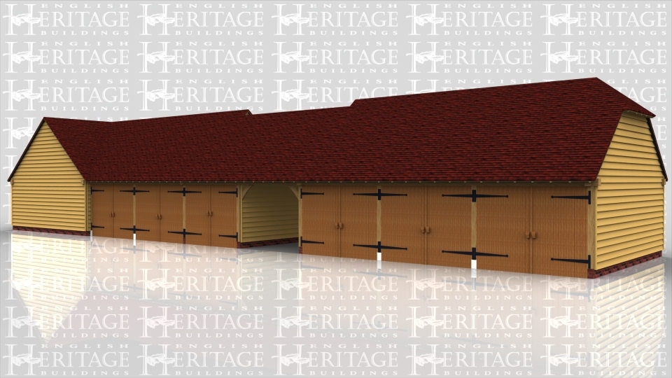 This oak framed building has nine bays. One of the bays is open. There are six sets of garage doors on the front there are two sets of garage doors on the rear of the building.
