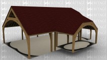 A 6 bay oak frame building made up of 2 frames. The first frame is 4 bays in size and is open on all sides, it has arched beams on the left and right with a gable roof on the left and a barn hip roof on the right. The second frame accounts for the other 2 bays and is also open on all sides with a barn hip roof on the right.