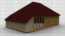 A 3 bay oak framed building with 2 pairs of iroko garage doors at the front as well as a 4 pane section of full height glazing to allow the natural light into the building. The left hand side of the frame has an internal aisle which at the rear has a small door on.