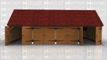 Four bay garage with rear catslide. All 4 bays have garage doors to keep the inside secure.